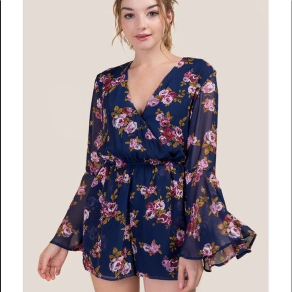 Francesca's Miami Floral Ruffle Romper in Navy - Picture 1 of 6
